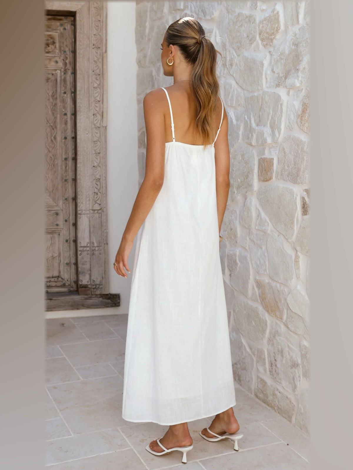 White midi formal dress, back full-length view showing the bodice