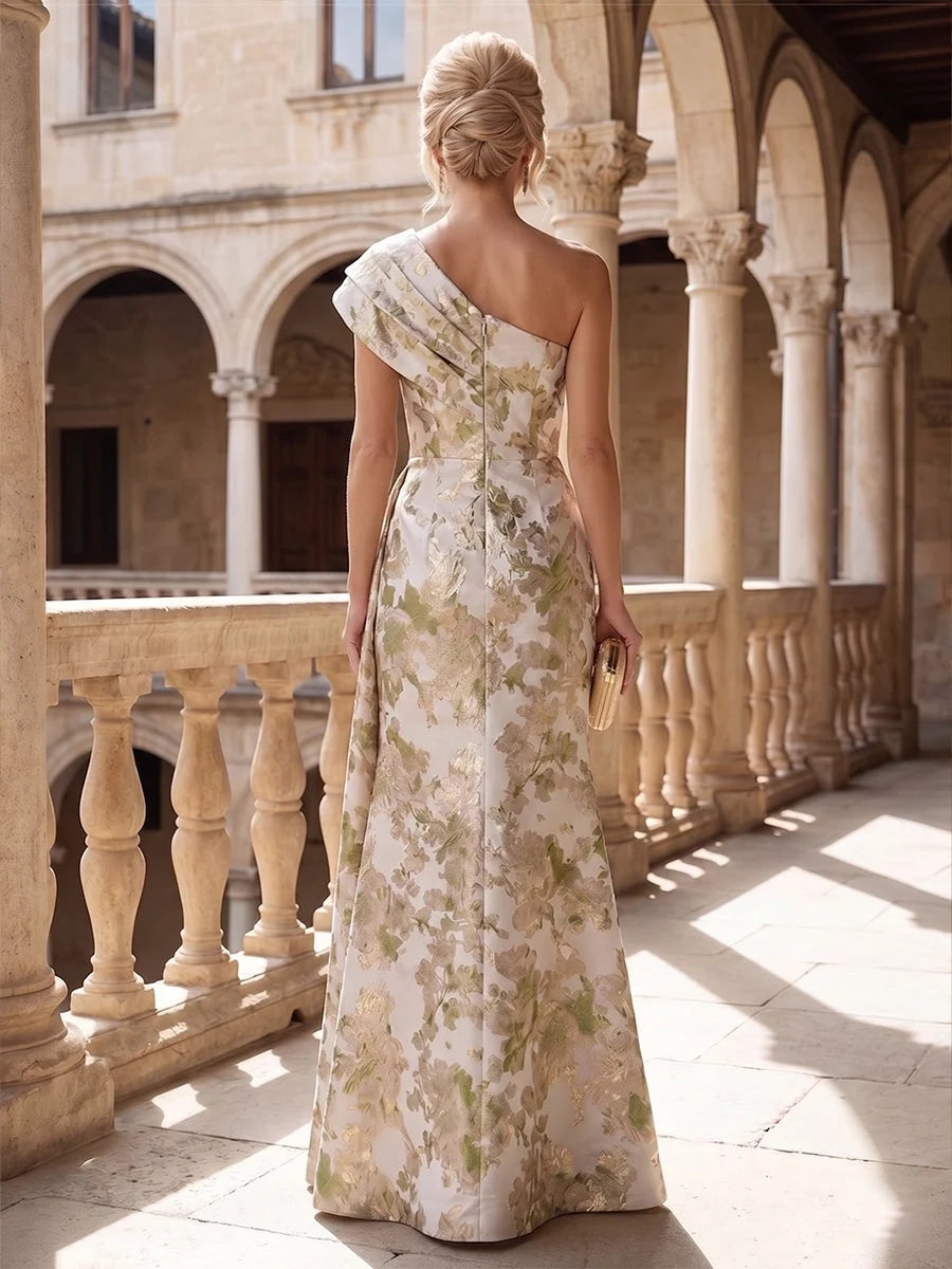 Cream floral one-shoulder mermaid gown with ruched drape, floor-length, back view.