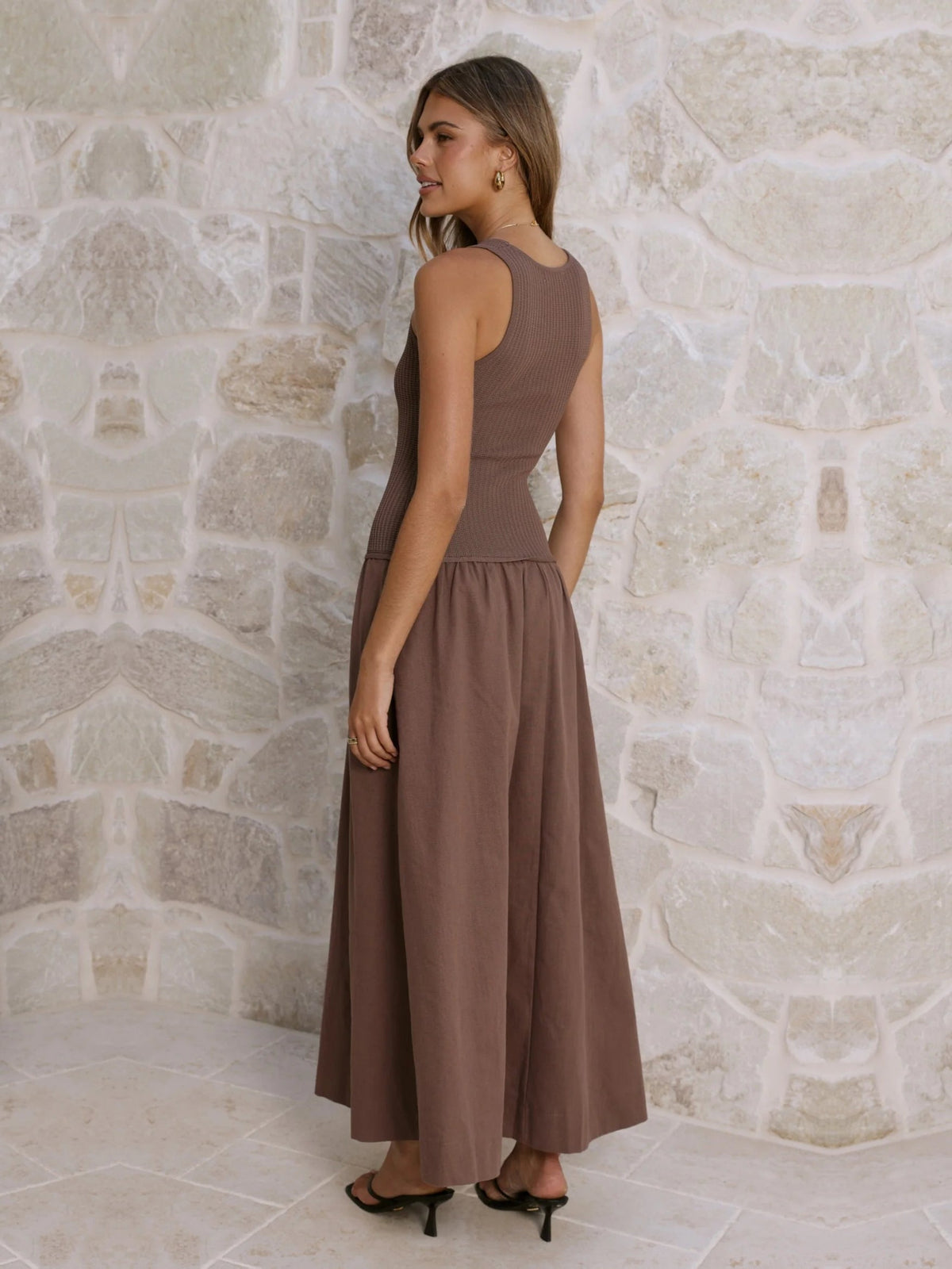 Chocolate a-line maxi formal dress with tiered skirt, full-length back view