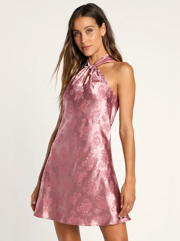 Pink satin halter mini dress with floral print, sleeveless A-line shape