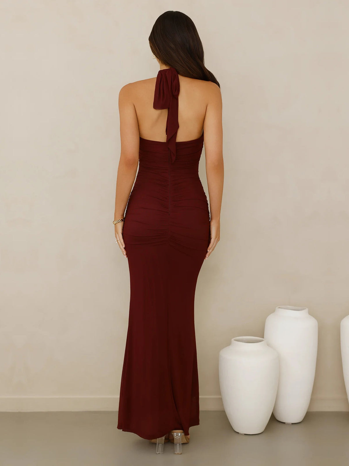 Burgundy sheath maxi formal dress with cutout detail, full-length back view