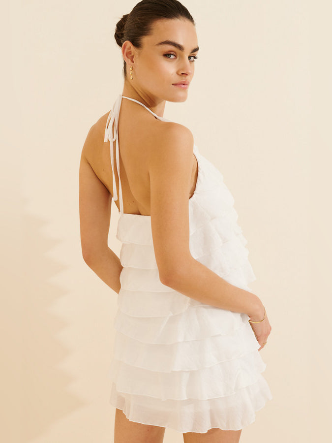 White tiered mini dress, open back with tie halter straps