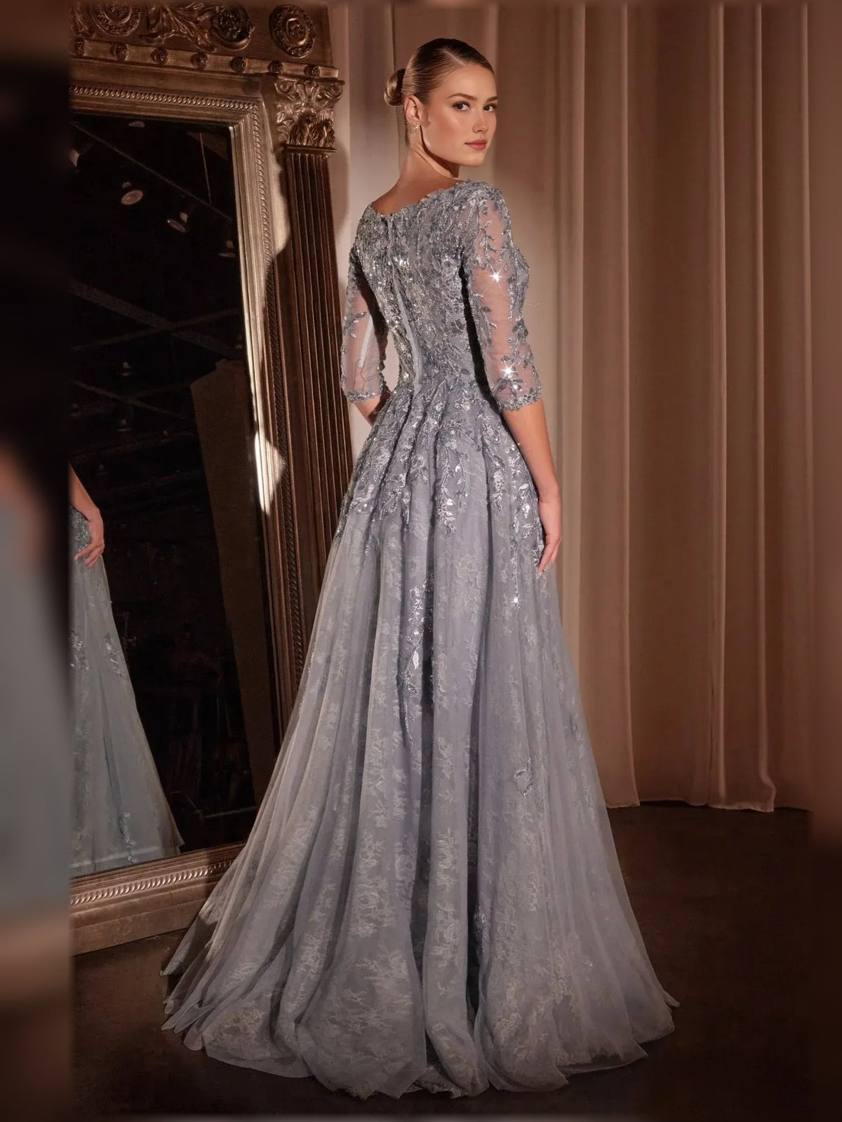 Silver beaded A-line lace formal dress, side view, 3/4 sleeves, floor-length