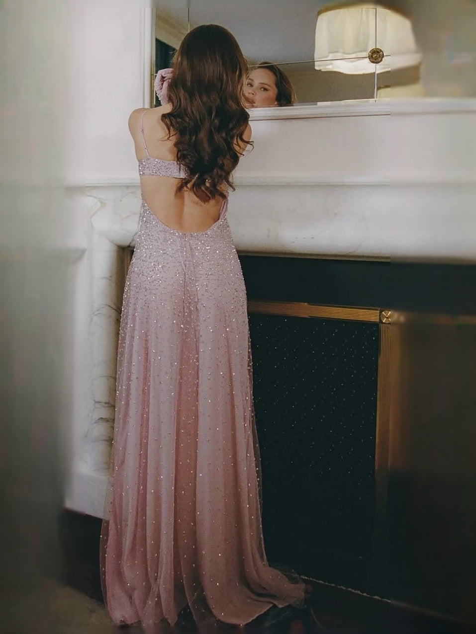 Blush pink glitter A-line prom dress with open back and thin spaghetti straps