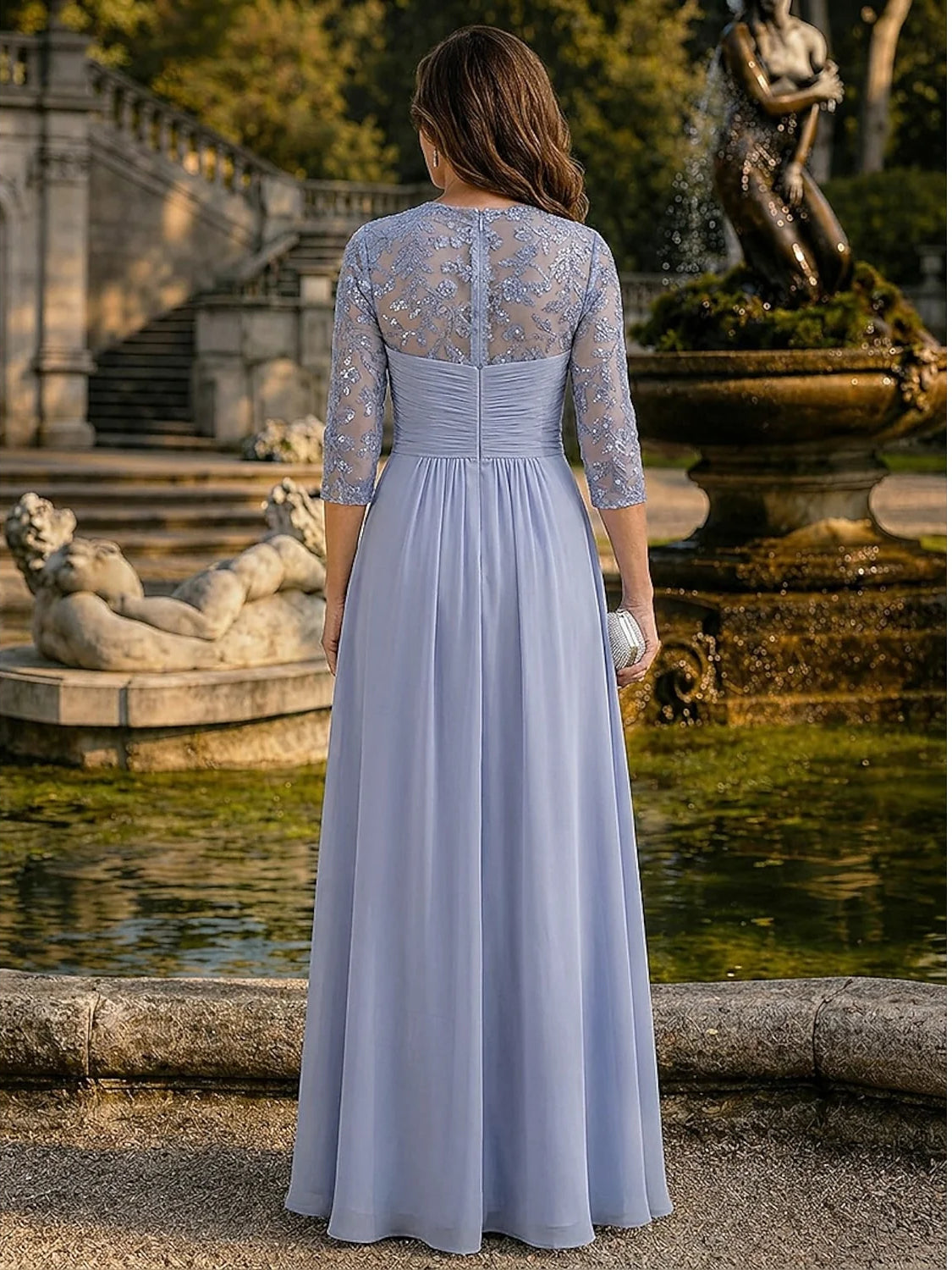 Dusty blue chiffon A-line dress with ruched waist and beaded lace illusion back