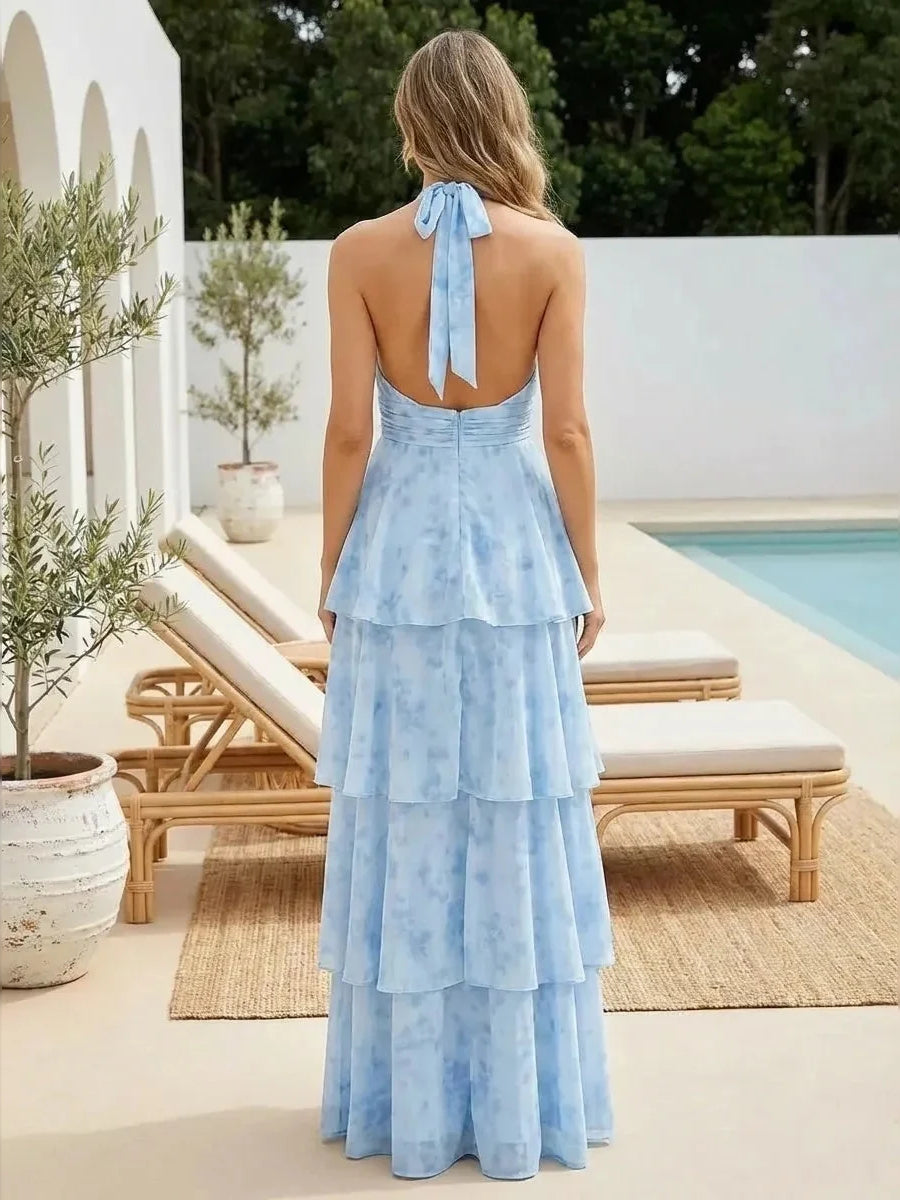 Light blue chiffon maxi dress with open back, halter straps, tiered ruffle skirt