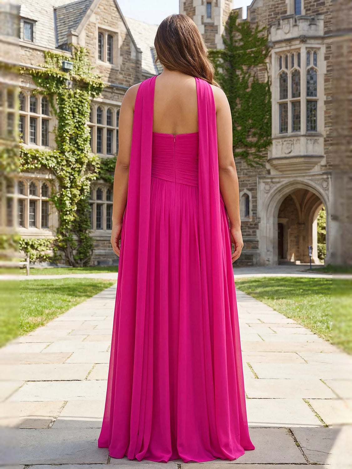 Fuchsia strapless sweetheart A-line maxi prom dress with draped pleats, back