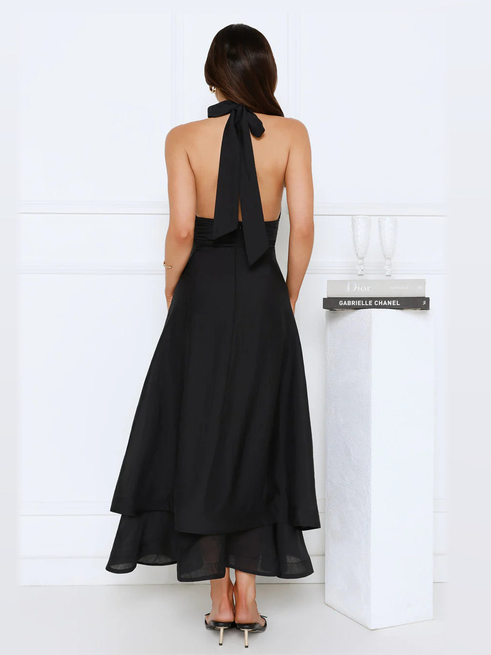 Black maxi formal dress, back full-length view showing the bodice