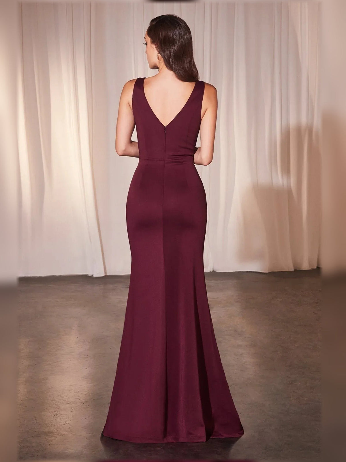 Cabernet back view: ruffled mermaid formal dress with V-back and high leg slit