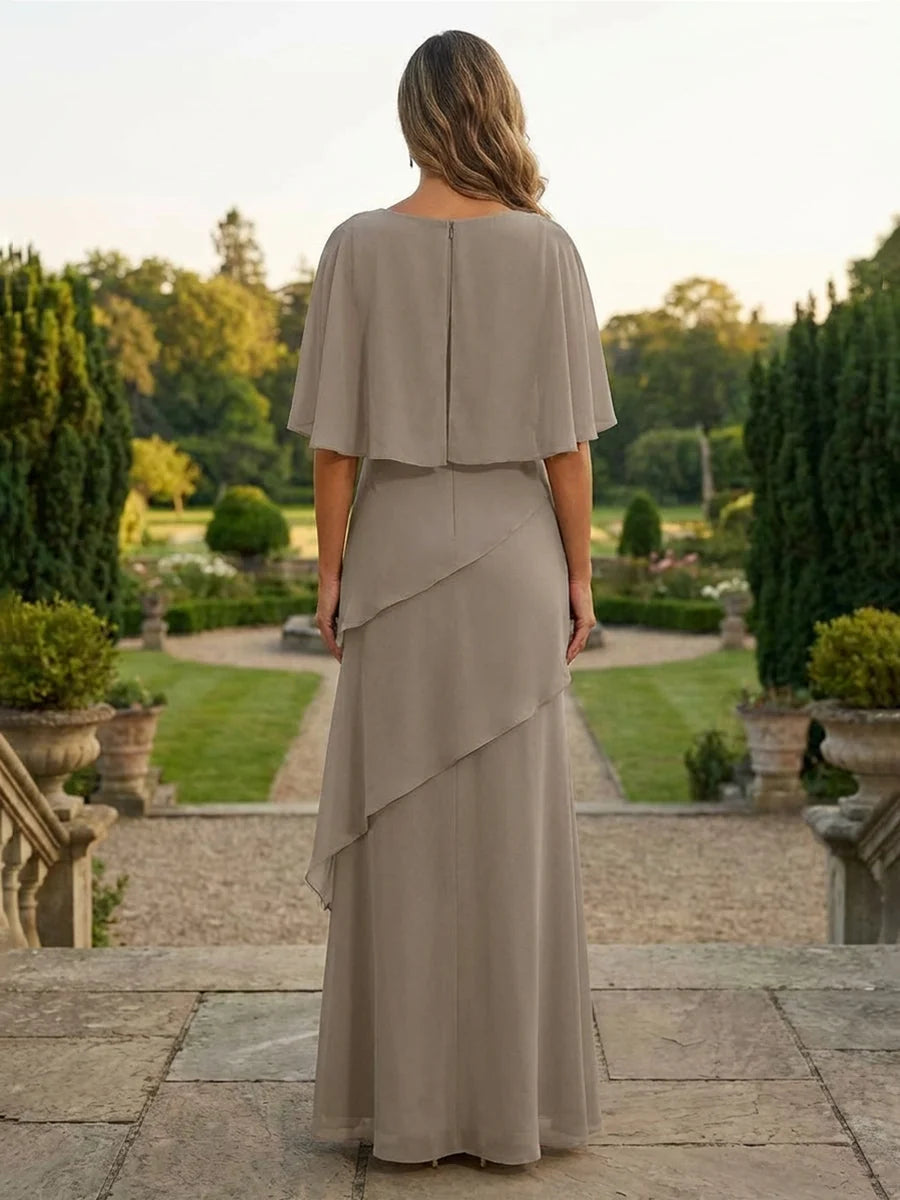 Light gray chiffon sheath dress, boat neck, layered back drape, flutter sleeves, long length