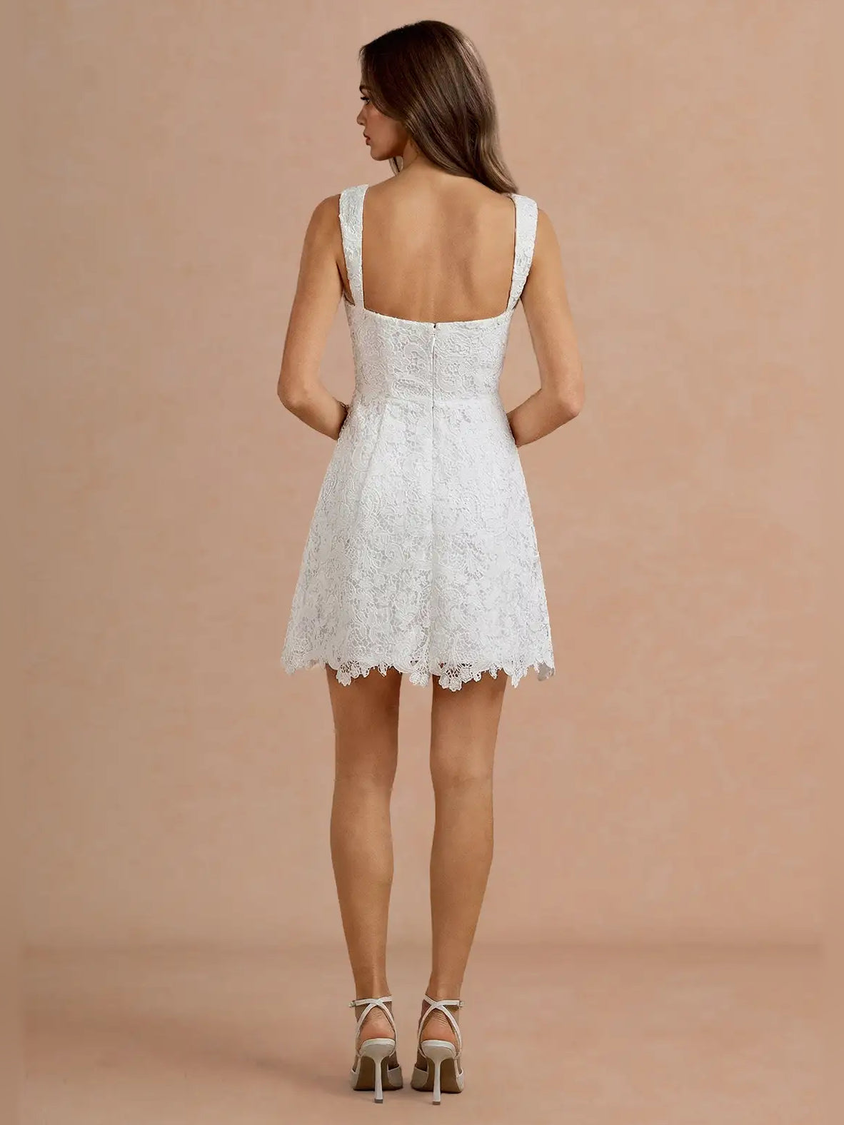 White floral lace A-line mini homecoming dress, back view with scoop back and straps