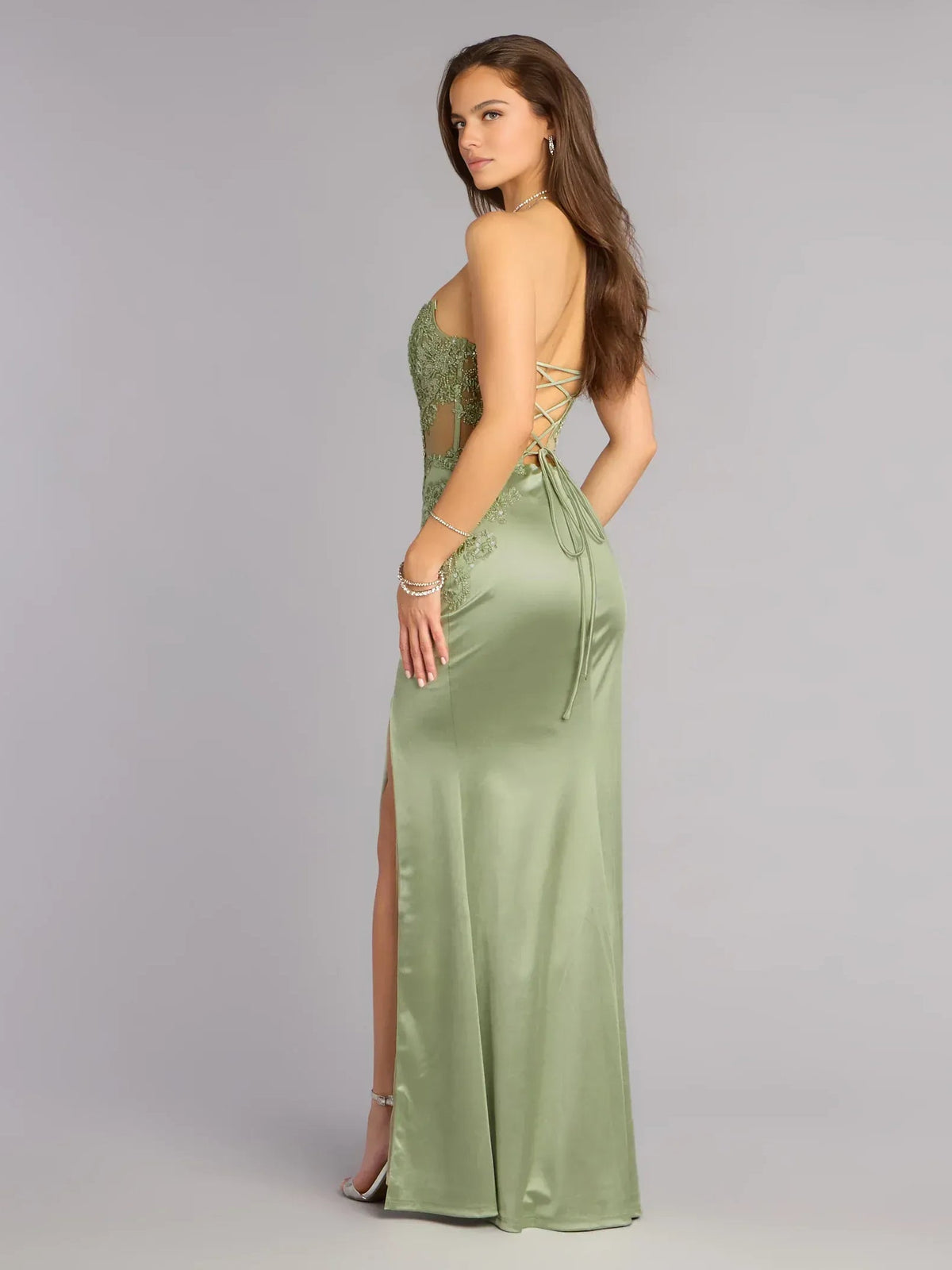 Sage green satin corset mermaid formal dress, strapless side view with thigh slit