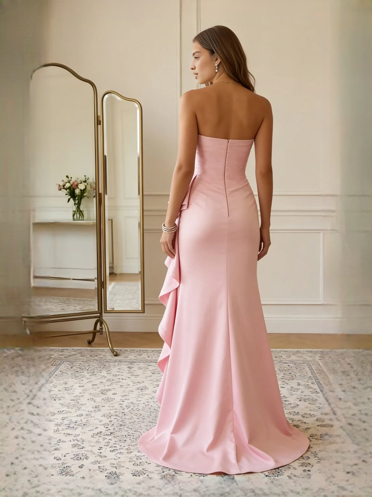 Pink strapless satin mermaid prom gown, low back, ruched bodice, ruffled slit