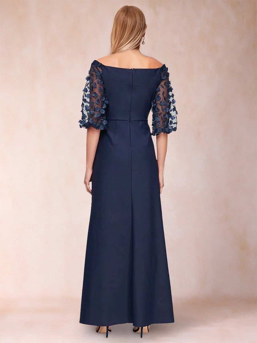 Back view of off-shoulder navy formal gown with lace sleeves and long A-line skirt