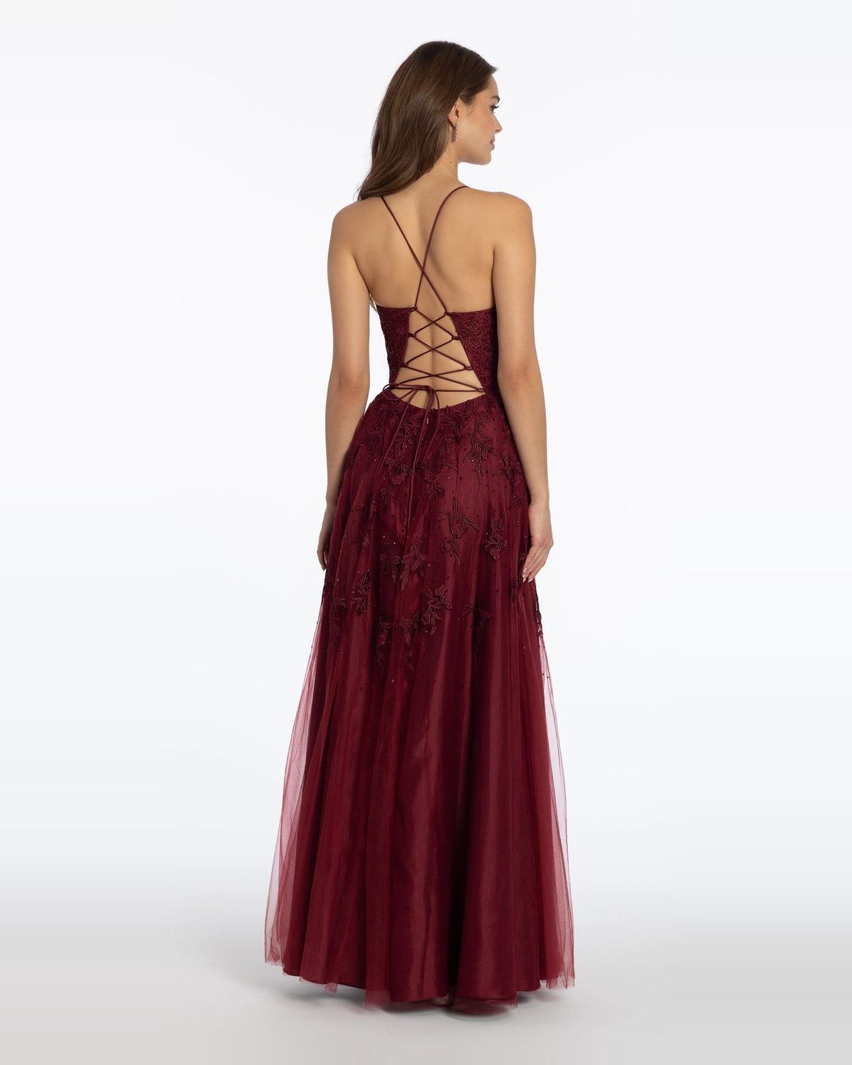 Burgundy A-line prom gown with crisscross open-back straps and sheer tulle skirt