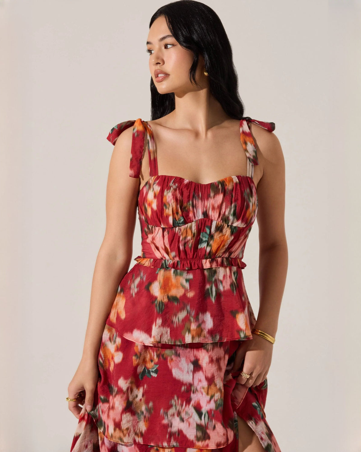 Red floral tiered maxi dress with sweetheart neckline, smocked bodice, tie shoulder straps