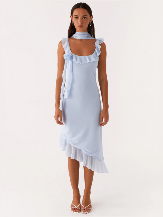 Light blue midi dress with ruffled shoulders and layered asymmetrical hem