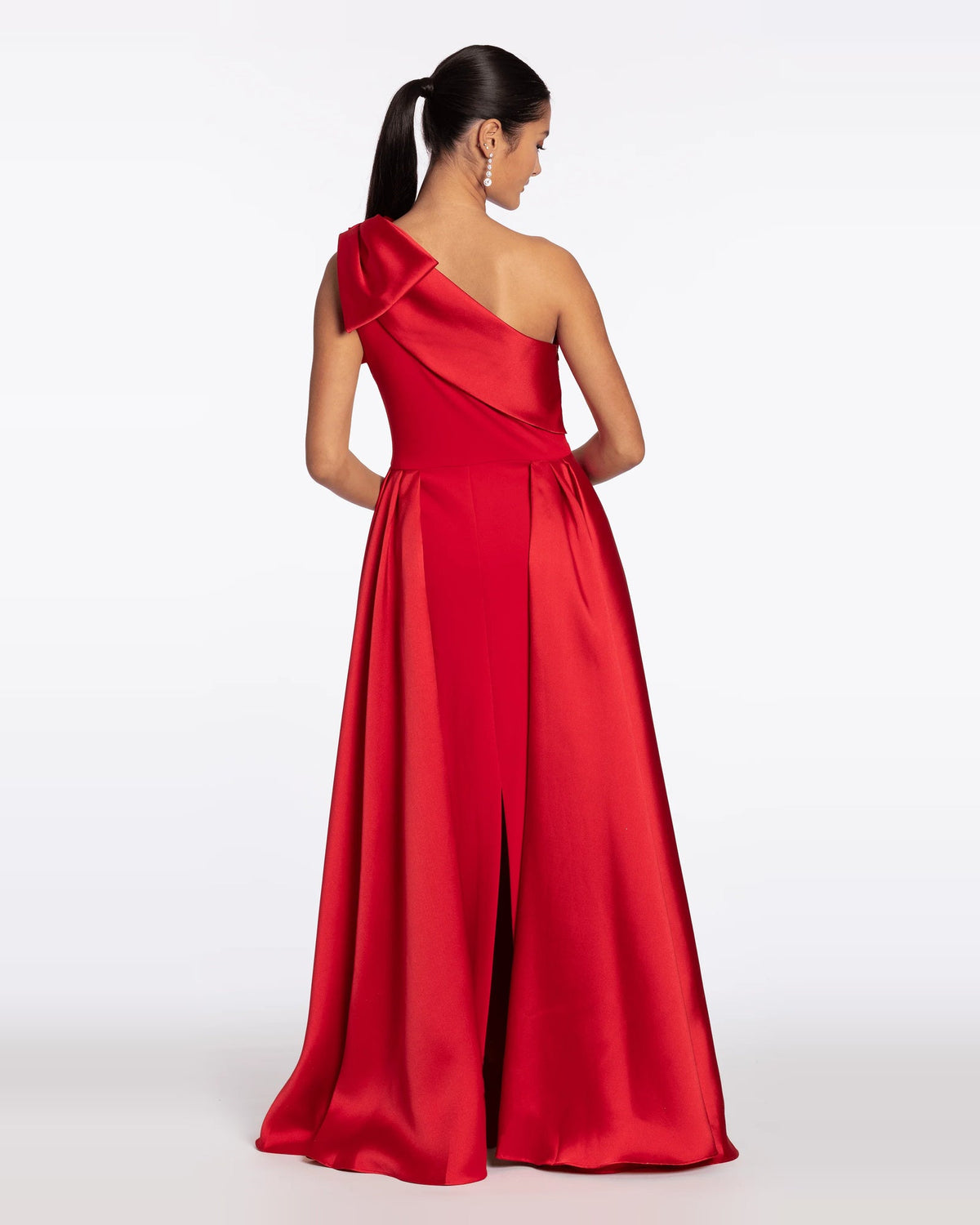 Red one-shoulder column maxi dress with draped bow detail and open back slit