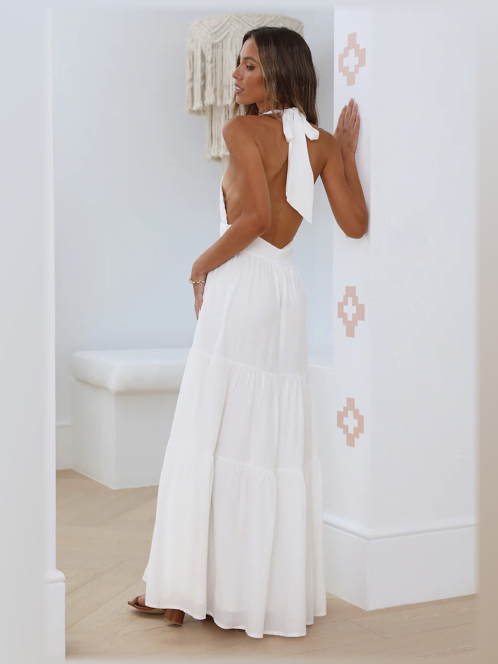 White maxi formal dress, back full-length view showing the bodice