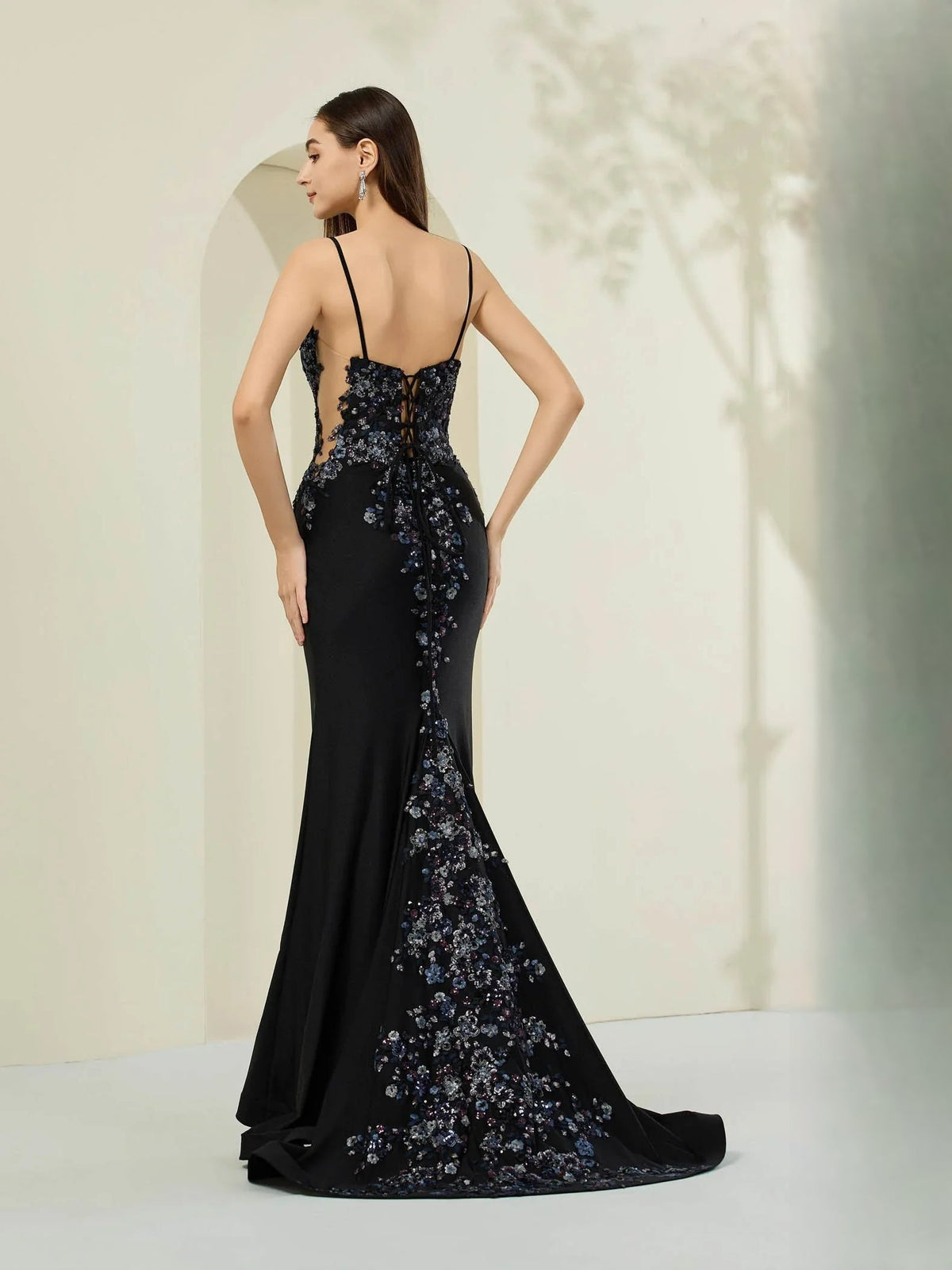 Black floral corset-style floor-length formal dress, open-back lace-up detail
