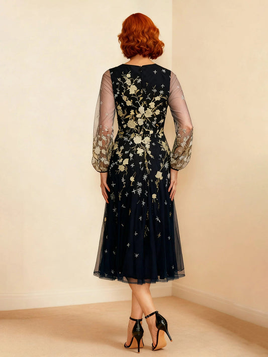 Back view: dark navy floral embroidered midi A-line dress with sheer sleeves
