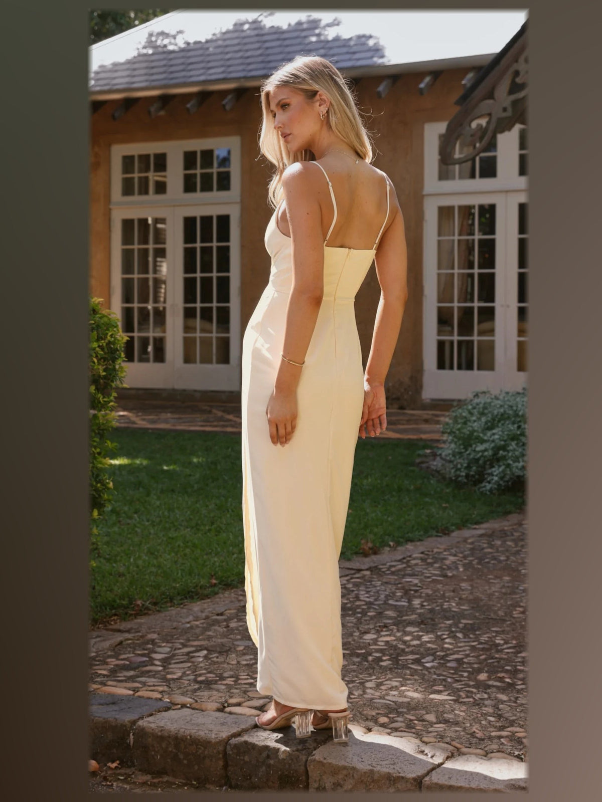 Yellow maxi formal dress, back full-length view showing the bodice