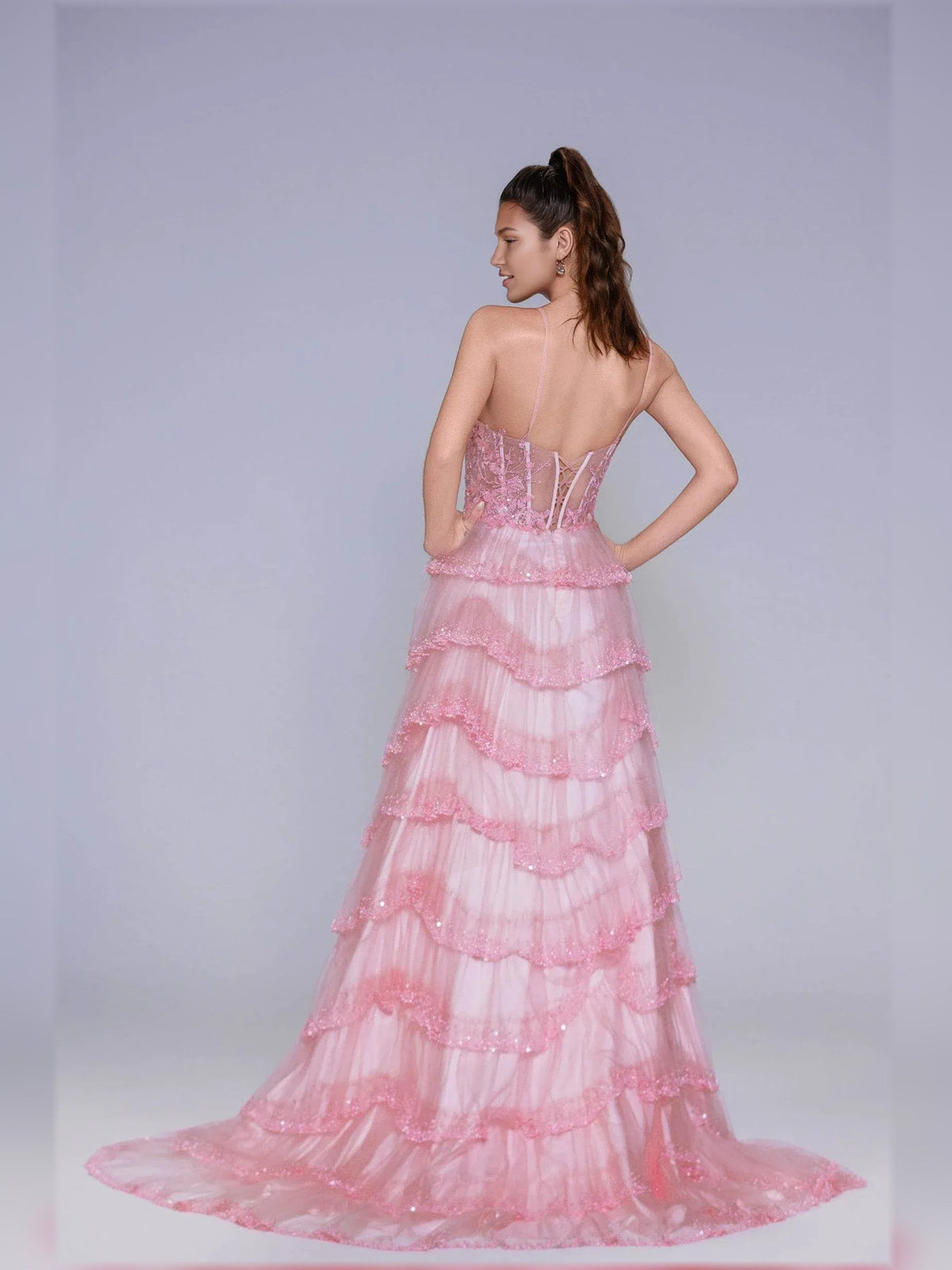 Light pink floral print tiered formal dress with spaghetti straps and low back