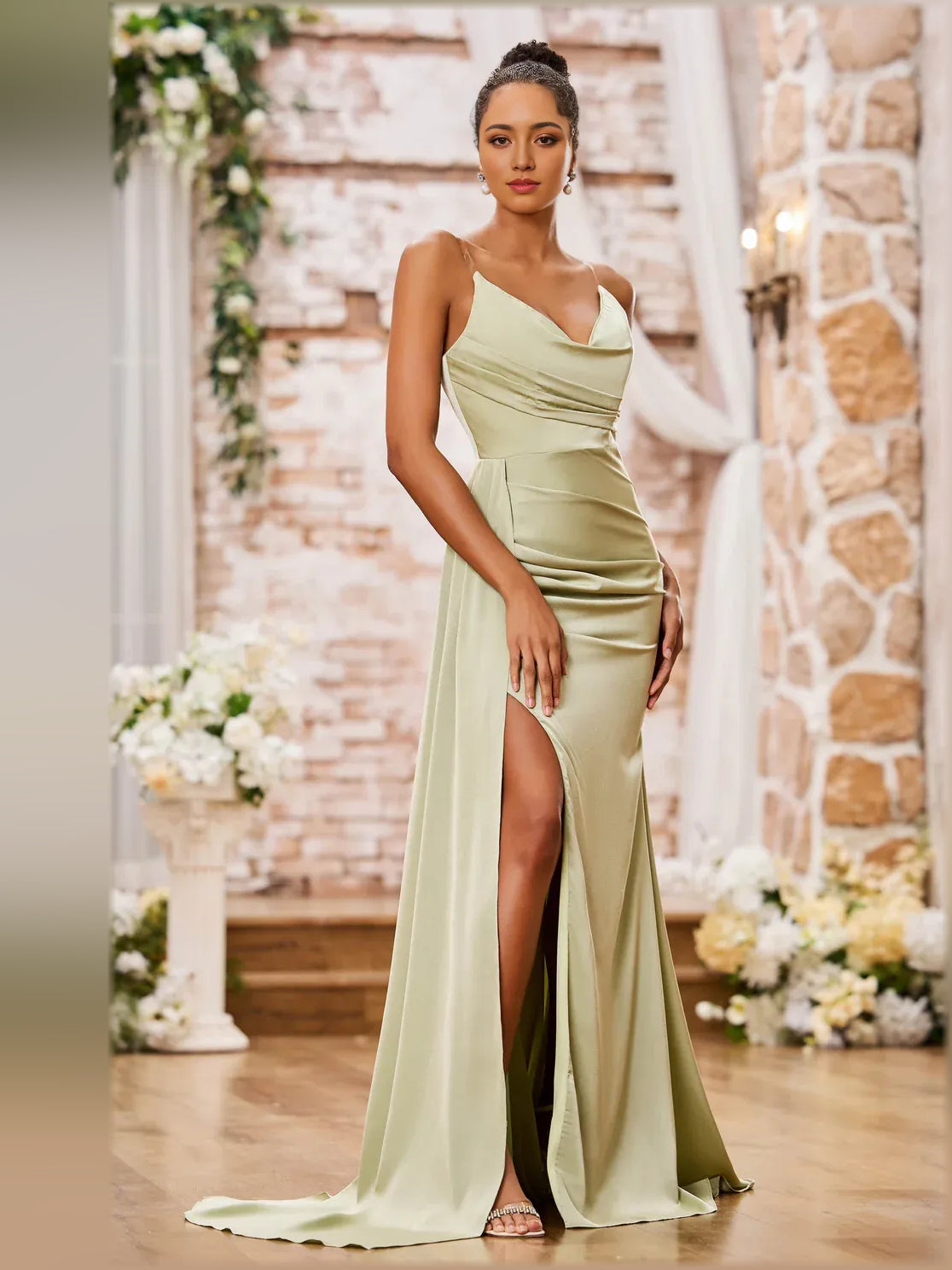 Sage green spaghetti-strap cowl-neck gown with ruching and deep front slit