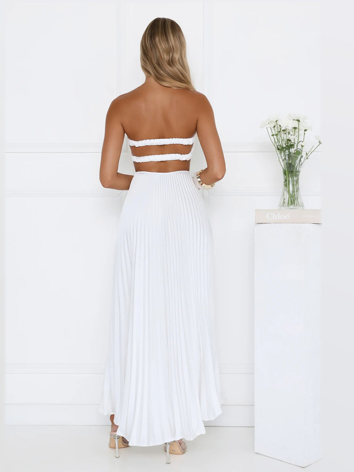 White maxi formal dress, back full-length view showing the bodice