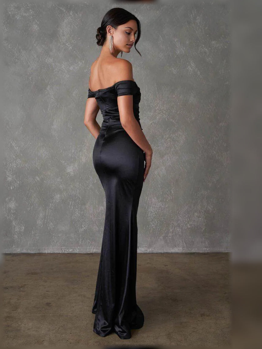 Black off-shoulder maxi dress with short sleeves, ruched fit, and high front slit