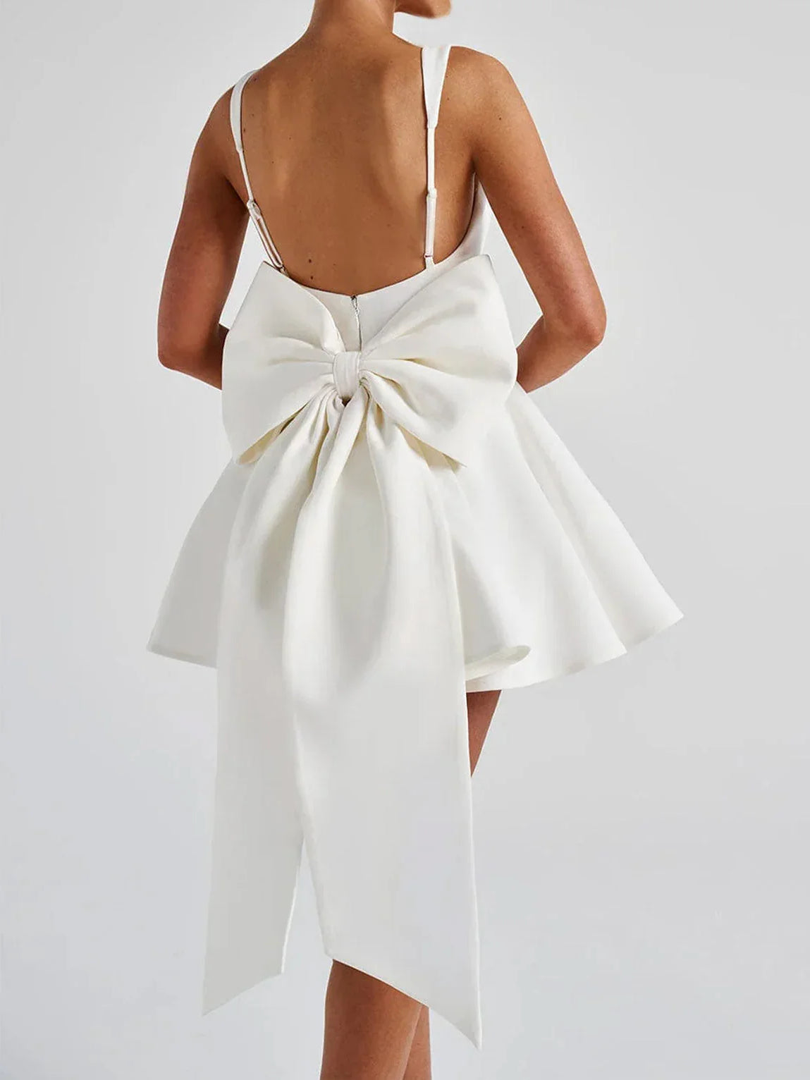 Ivory open-back A-line mini dress with corset bodice and large back bow