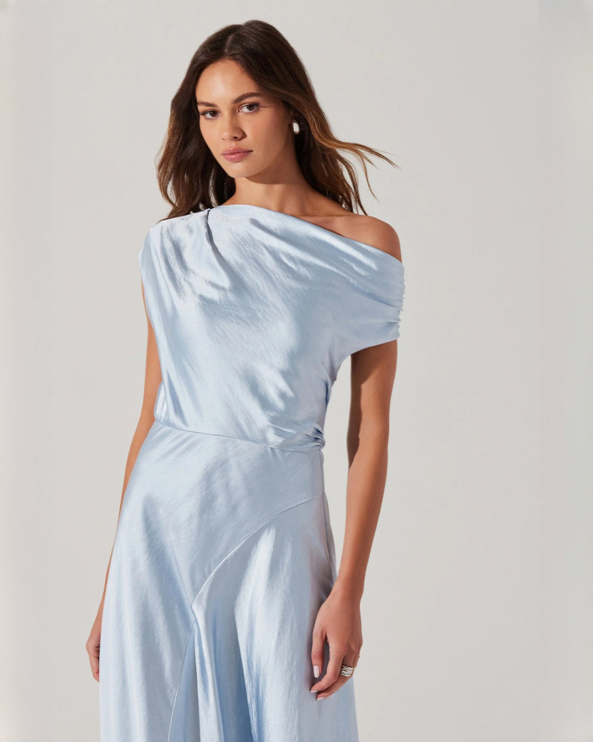 Light blue satin sleeveless midi dress with draped wrap neckline and gathered waist