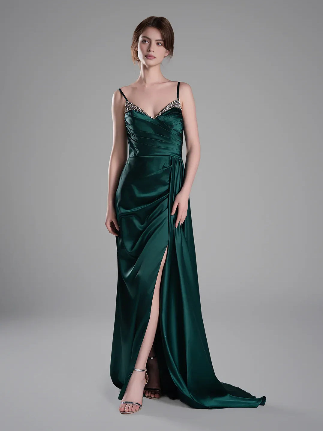 Peacock green satin V-neck formal dress with ruching, spaghetti straps, and side slit.