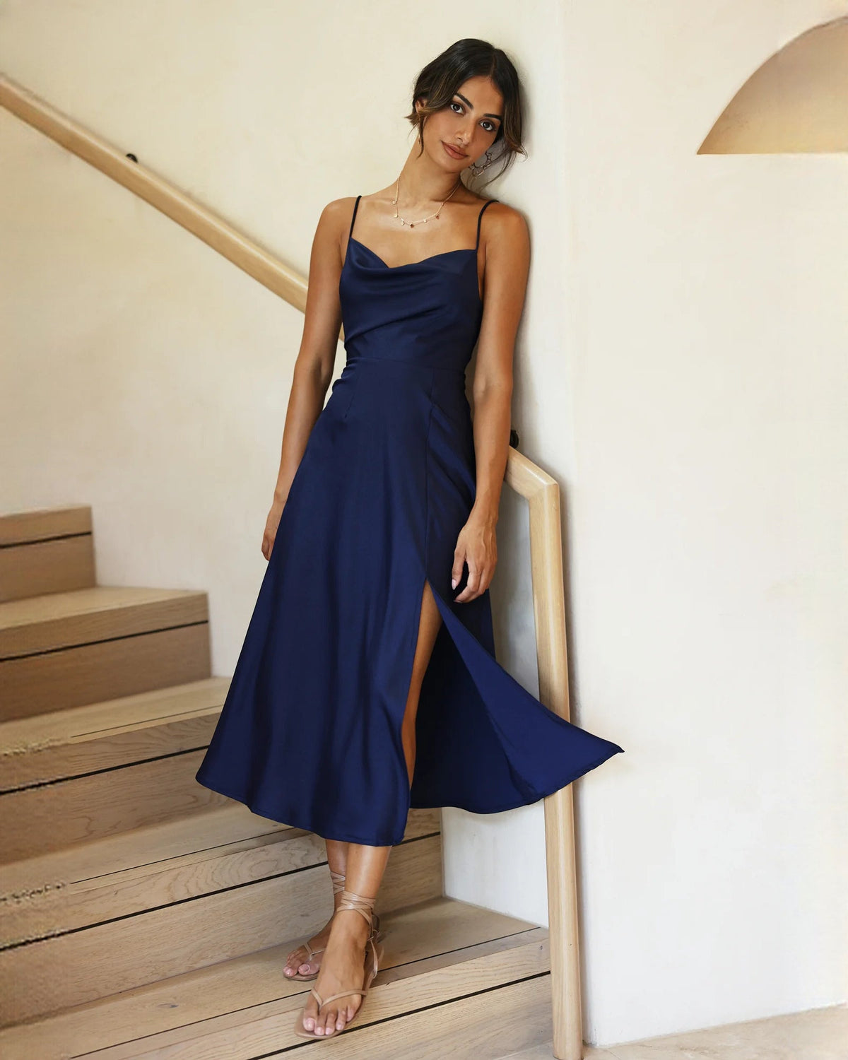 Navy satin A-line maxi bridesmaid dress with cowl neckline and side slit