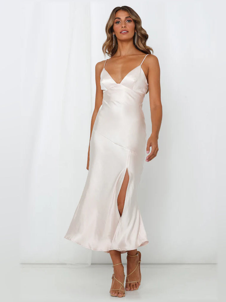 Champagne satin midi dress with V-neck, spaghetti straps, fitted waist, flowing skirt slit