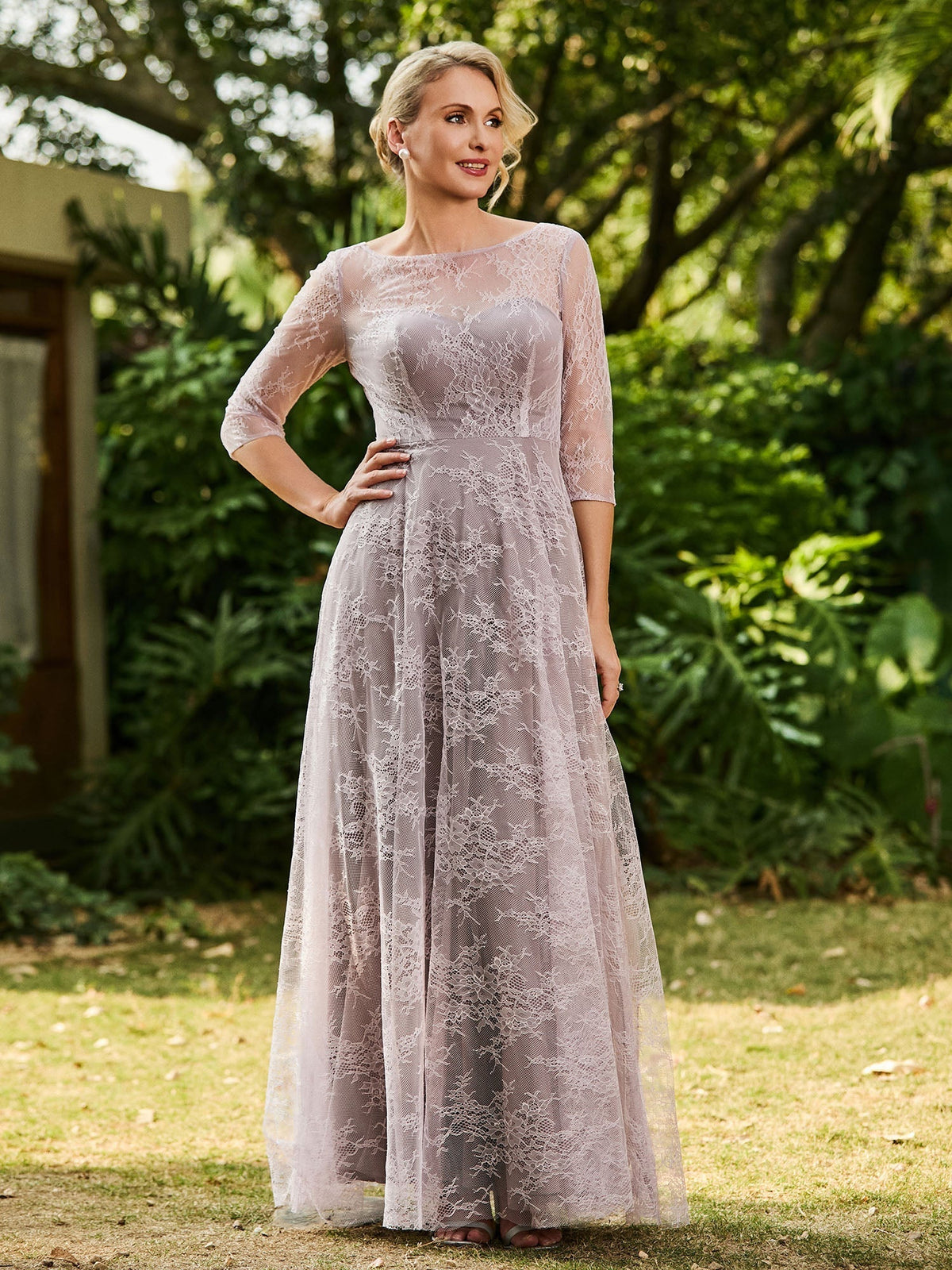 Lilac lace A-line maxi dress with round neckline and 3/4 sleeves