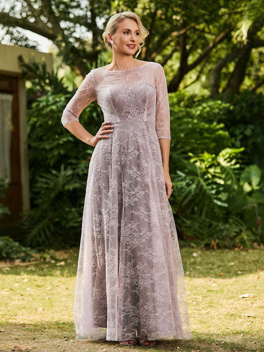 Lilac lace A-line maxi dress with round neckline and 3/4 sleeves