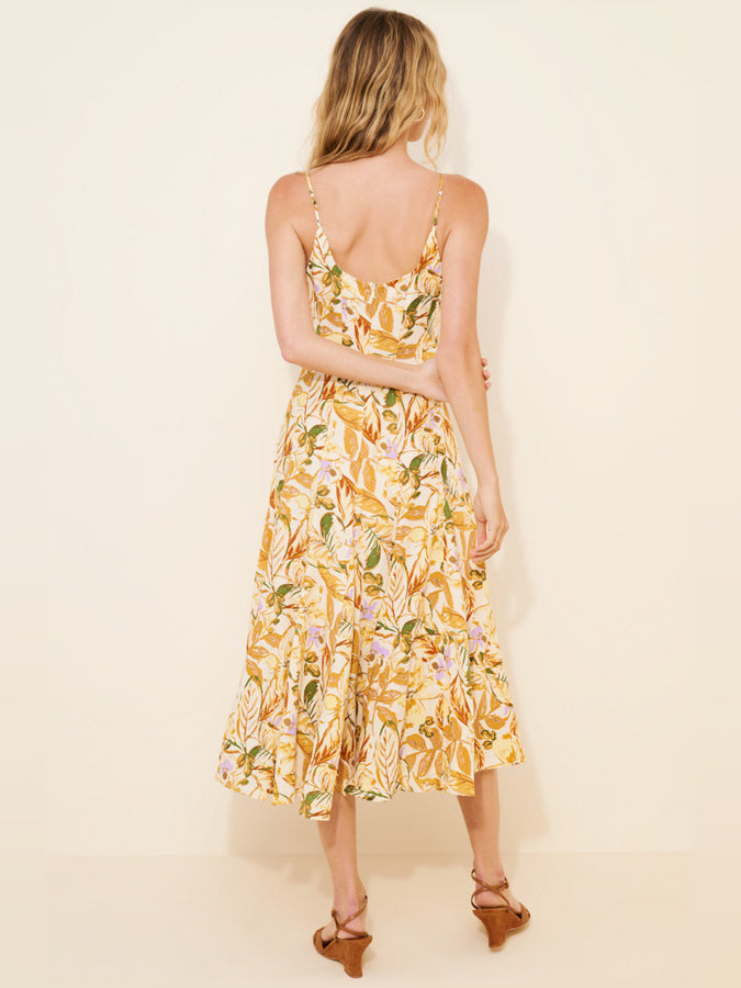 Orange floral midi dress with open scoop back, spaghetti straps, and tiered skirt
