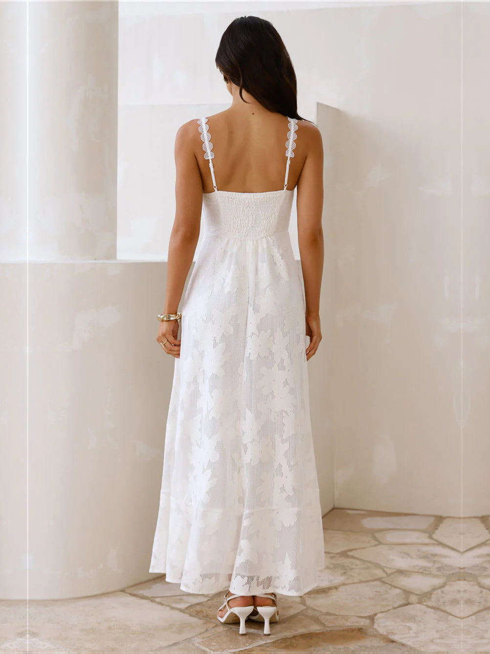 Cream a-line maxi formal dress with floral print, full-length back view