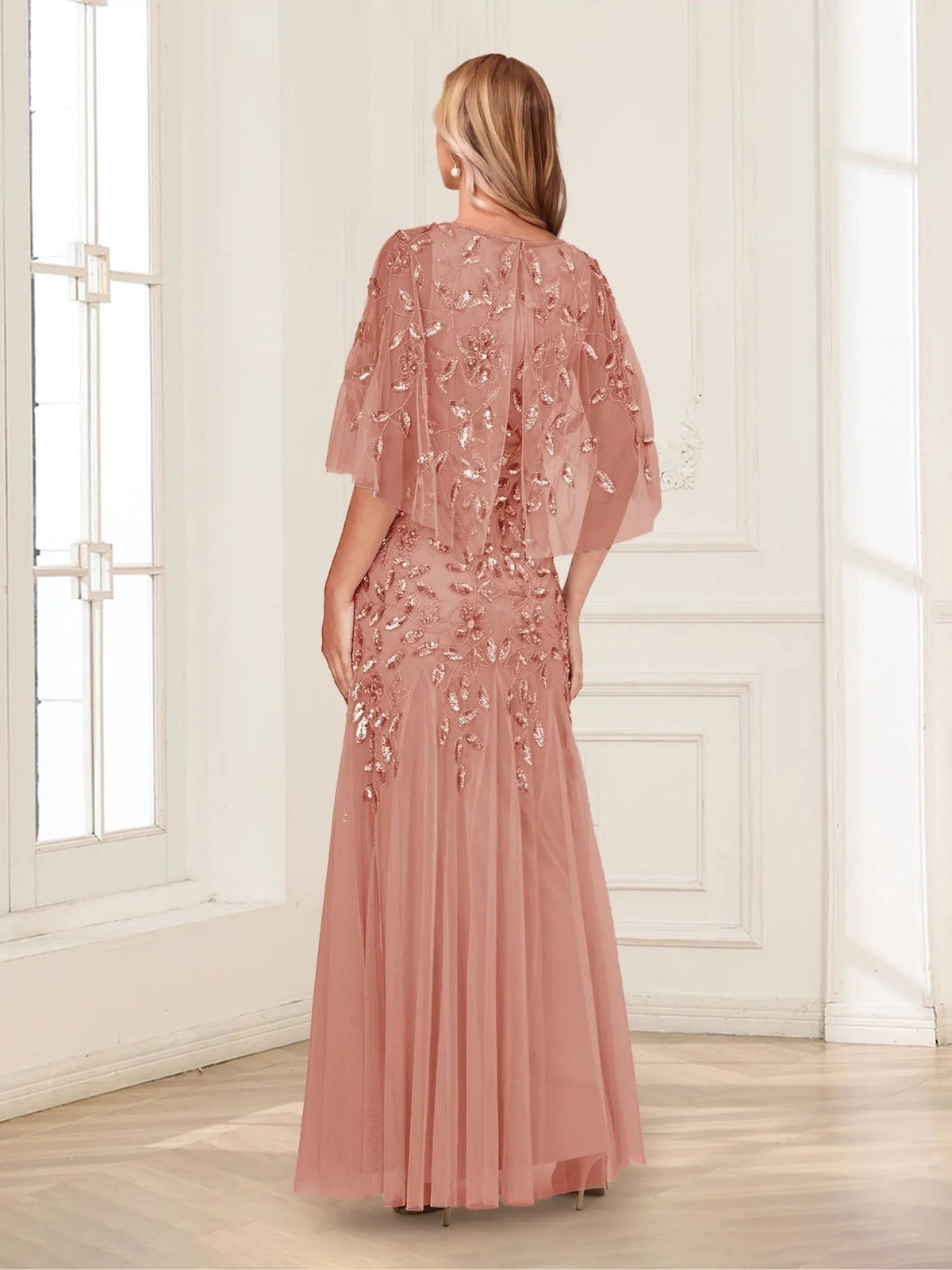 Dusty rose sequin tulle mermaid dress from back view, cape sleeves, floor-length