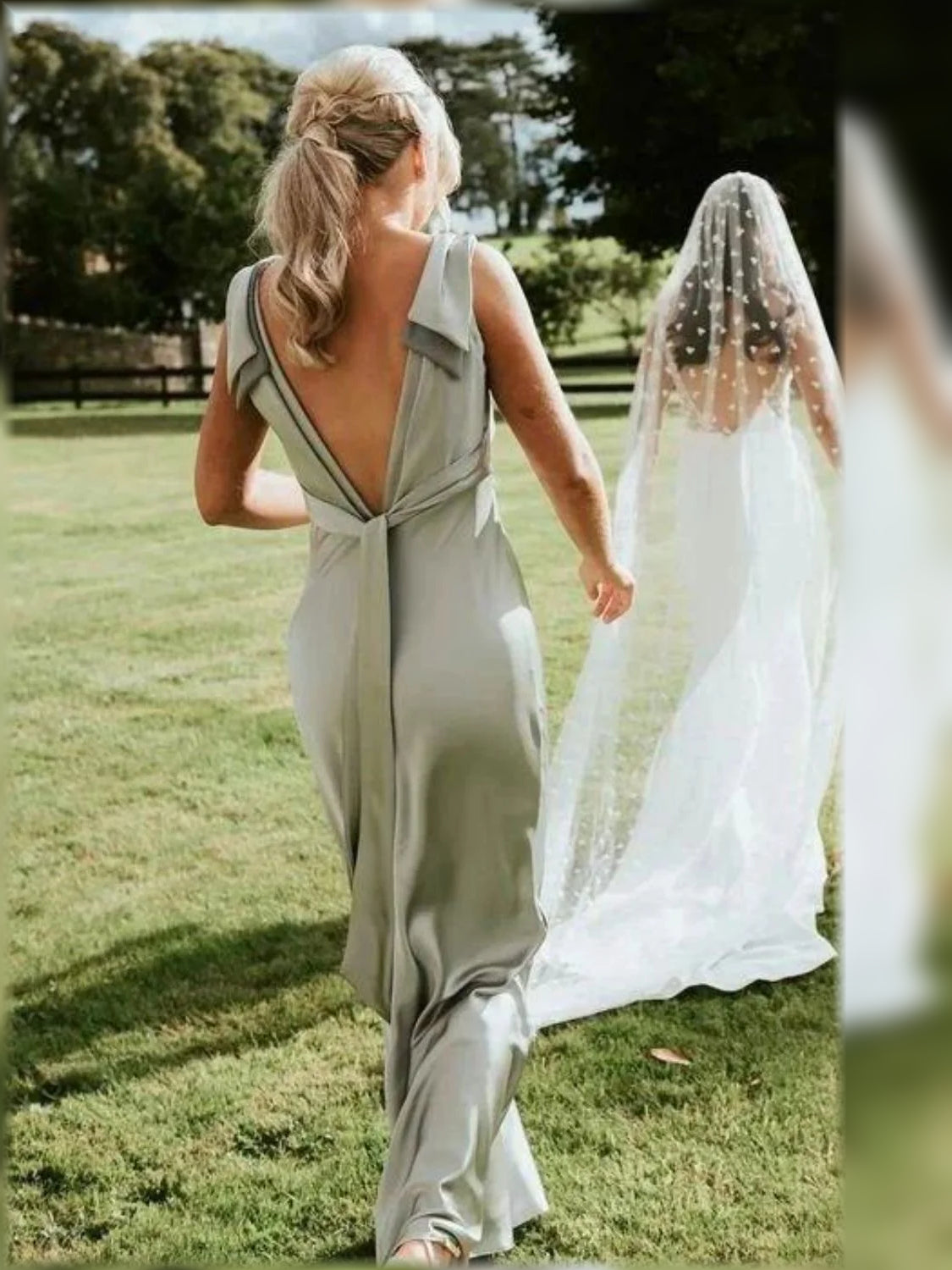 Backless V-neck satin A-line bridesmaid dress in sage, floor-length with long train