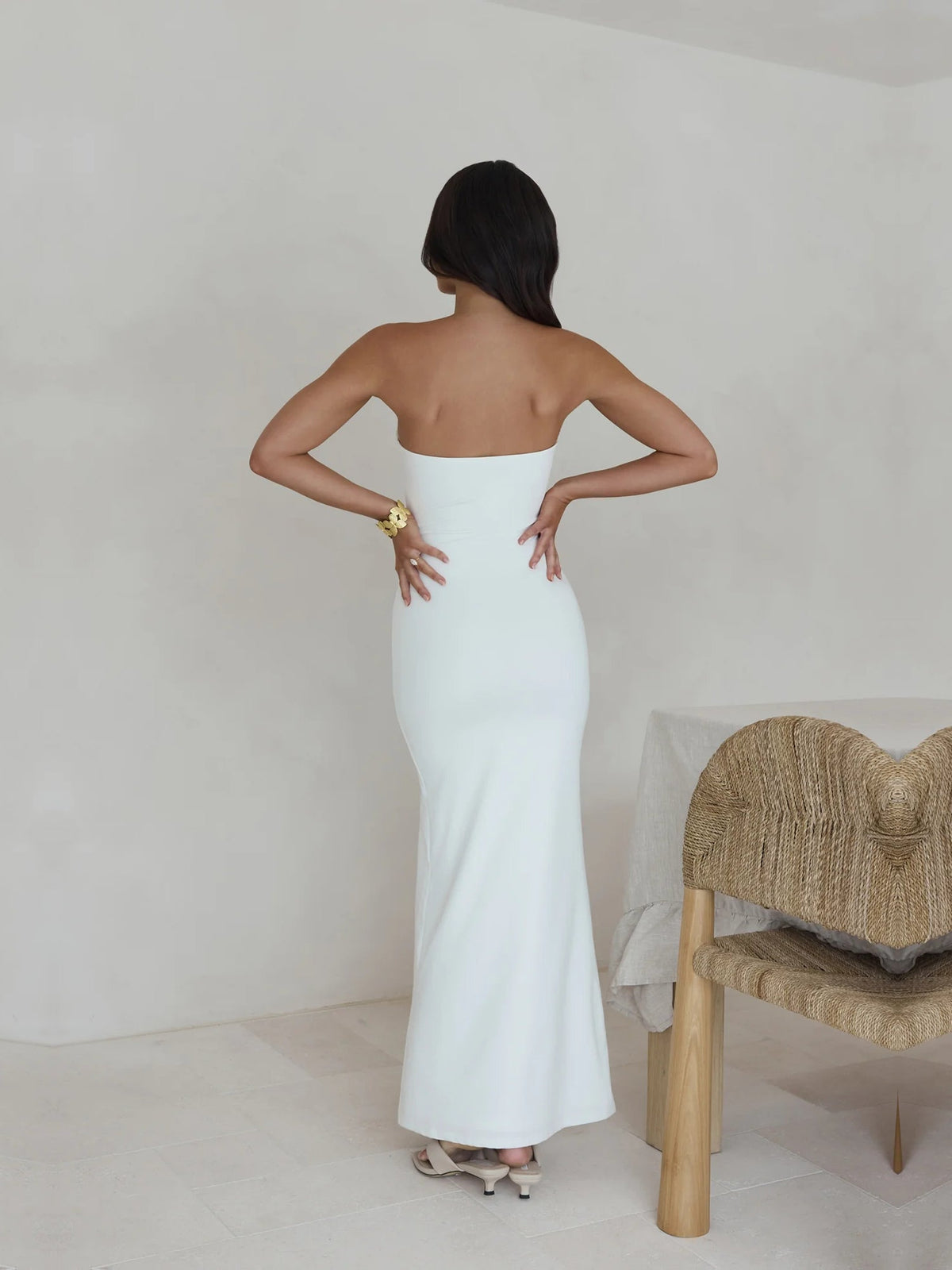 White a-line maxi formal dress with a-line, full-length back view
