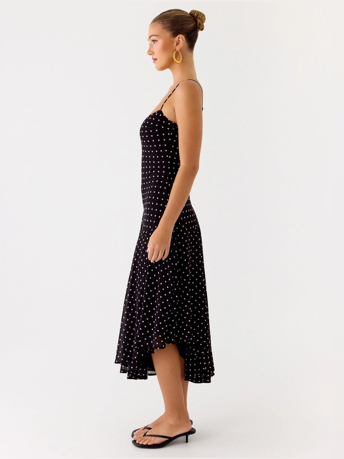 Black midi formal dress, side view: spaghetti straps, square neckline, dotted sparkle, asym hem