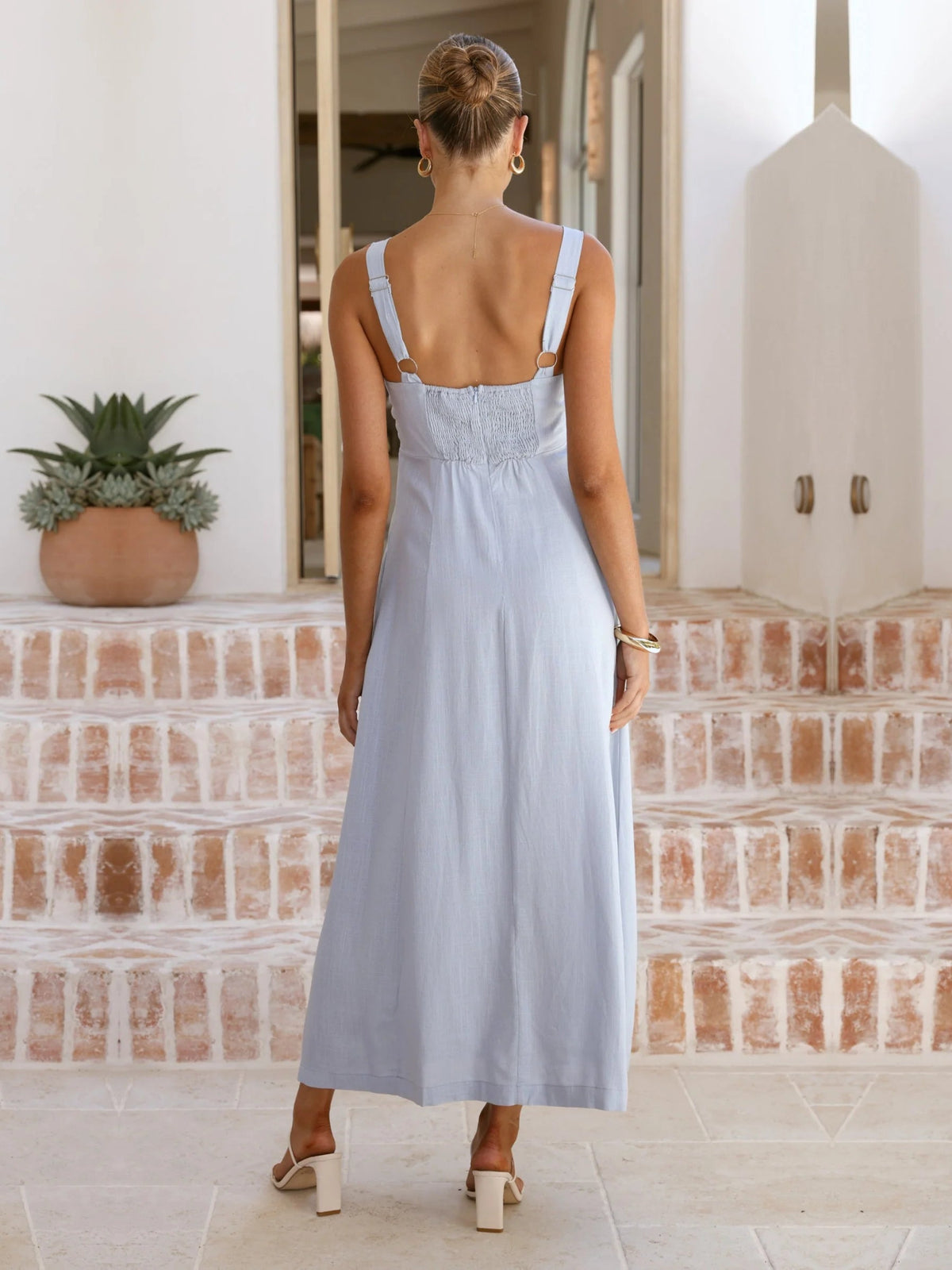 Blue a-line maxi formal dress with a-line, full-length back view