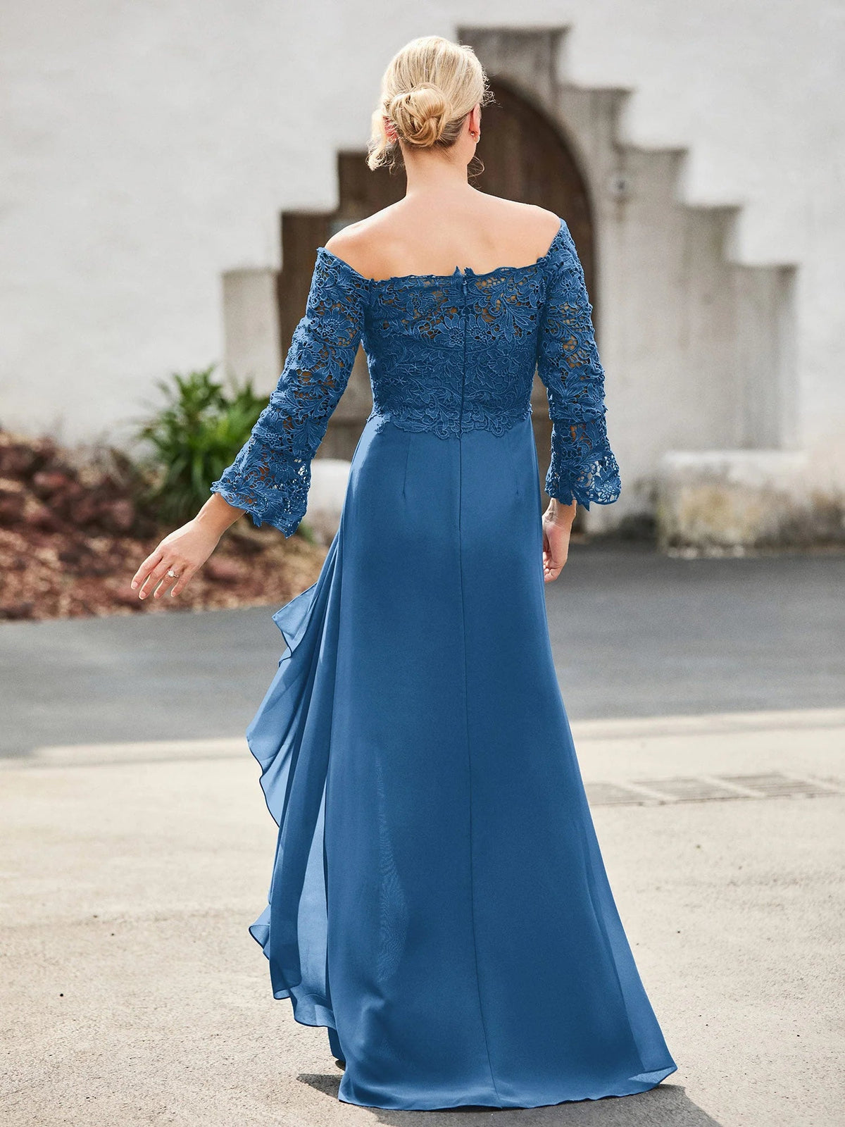 Ink blue off-shoulder lace sheath dress with long sleeves and flowing chiffon panels