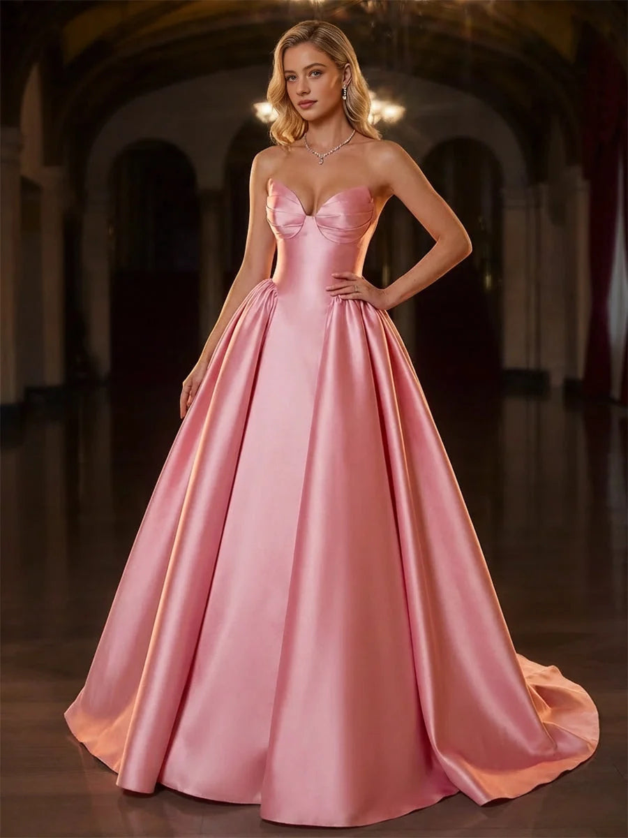 Light pink satin corset prom dress with sweetheart neckline and full A-line skirt