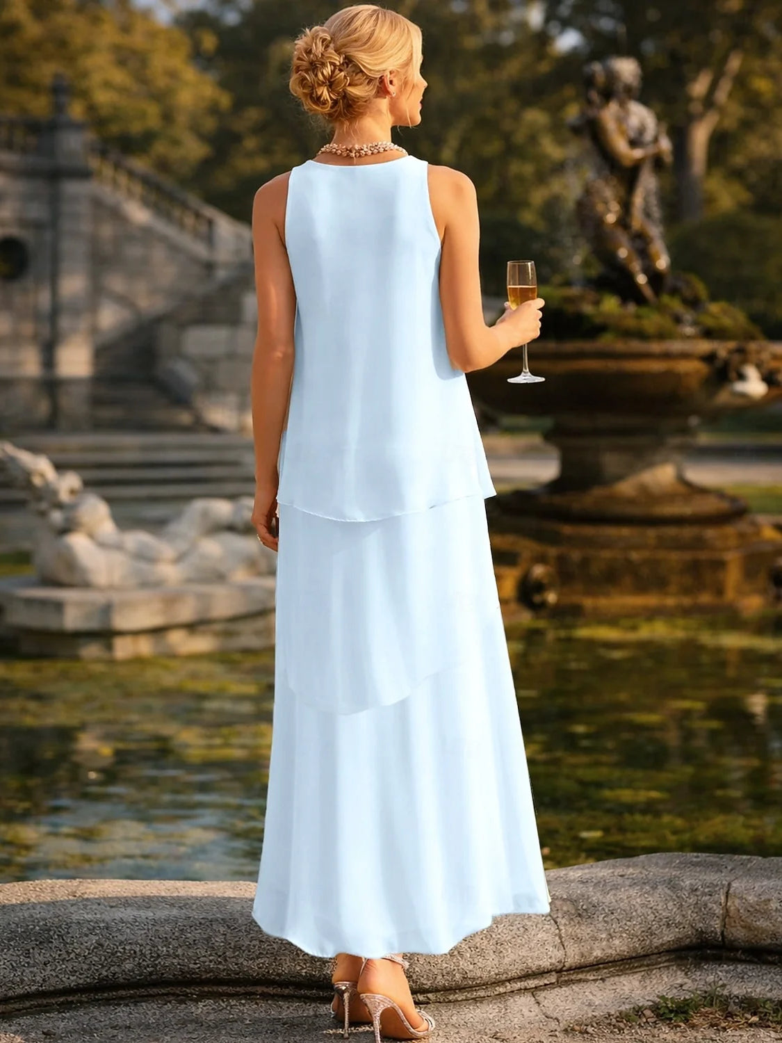 Light blue tiered chiffon maxi dress, scoop neck, sleeveless A-line back view
