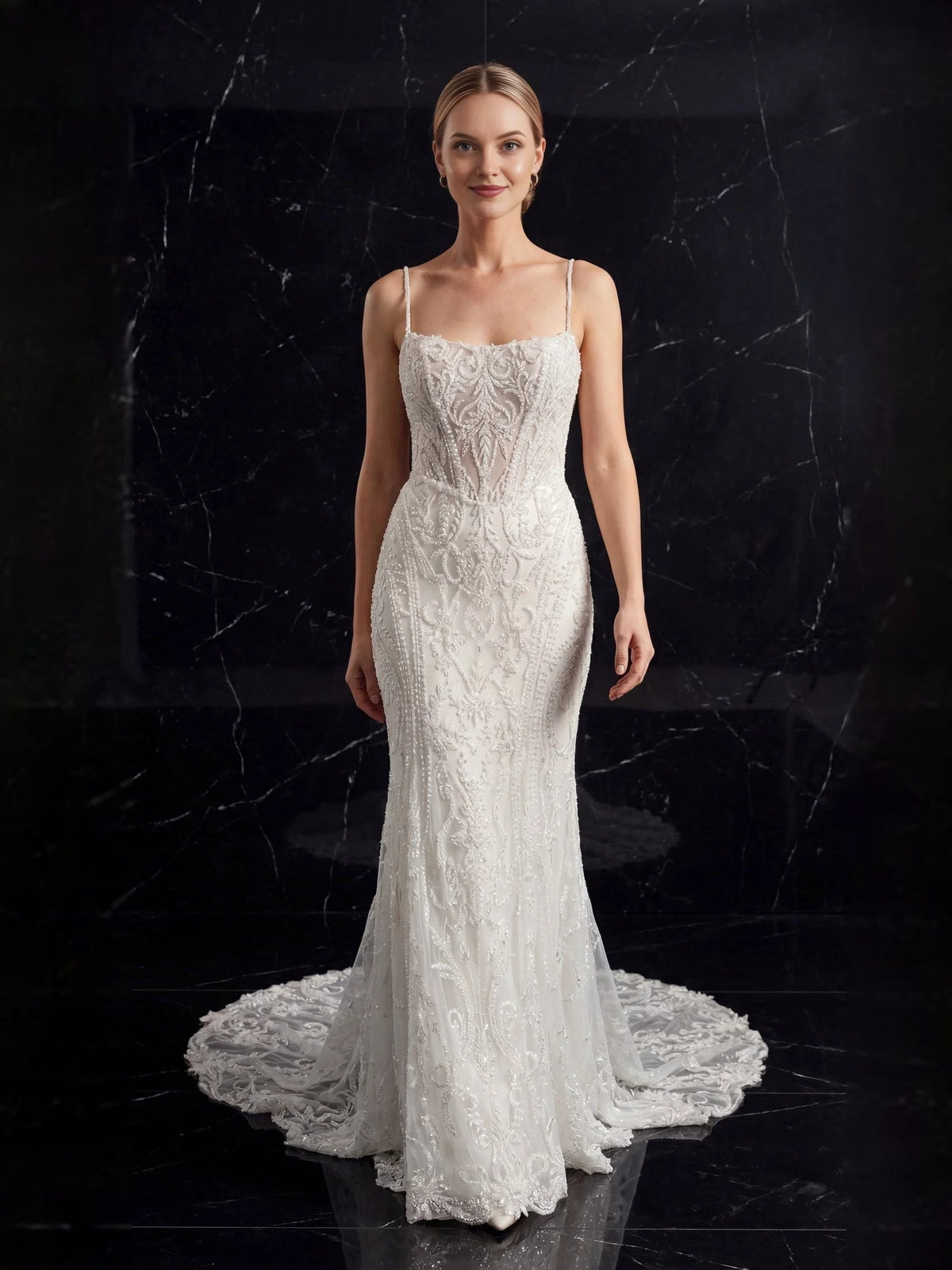 Ivory mermaid wedding dress with illusion sweetheart neckline and lace-embellished bodice