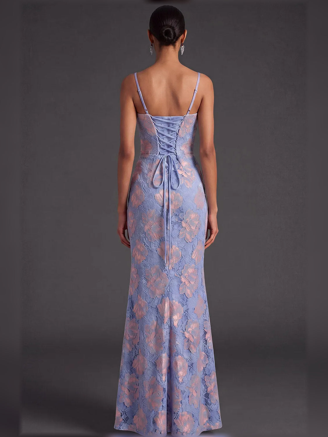 Back view blue floral corset-style maxi dress with spaghetti straps and lace-up detailing