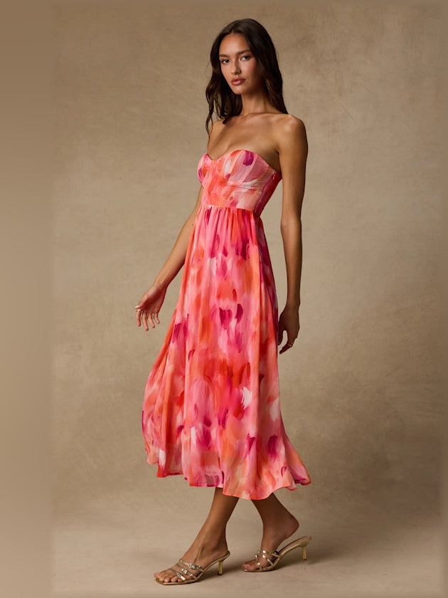Coral pink abstract strapless midi formal dress with sweetheart bodice and flowing skirt